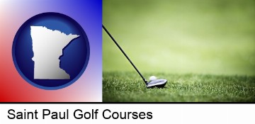 a golf ball and a golf club on a golf course in Saint Paul, MN