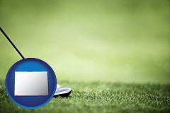 colorado map icon and a golf ball and a golf club on a golf course