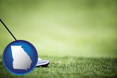 georgia map icon and a golf ball and a golf club on a golf course