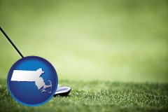 massachusetts map icon and a golf ball and a golf club on a golf course