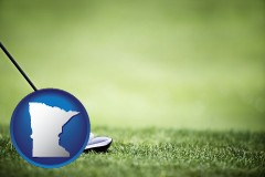 minnesota map icon and a golf ball and a golf club on a golf course
