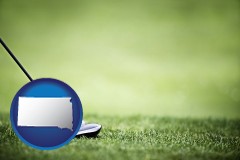 south-dakota map icon and a golf ball and a golf club on a golf course