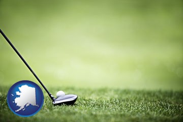 a golf ball and a golf club on a golf course - with Alaska icon