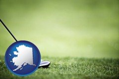 alaska a golf ball and a golf club on a golf course