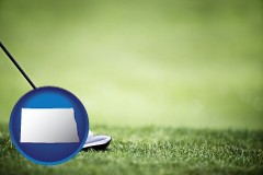 north-dakota a golf ball and a golf club on a golf course